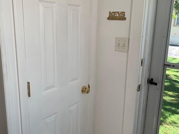 Coat closet at front entrance.
