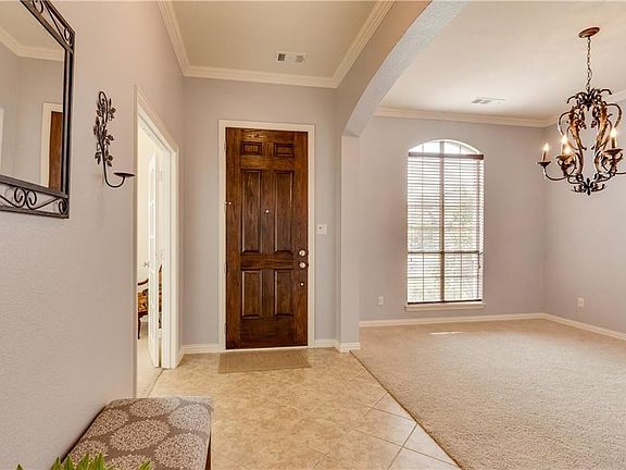 Wonderful entry way that opens to the formal dining room.