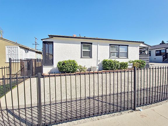 2nd image of 9436 S Manhattan Pl Front 9436