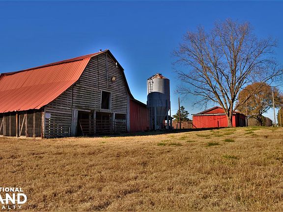  Barn and storage building with grain bin.