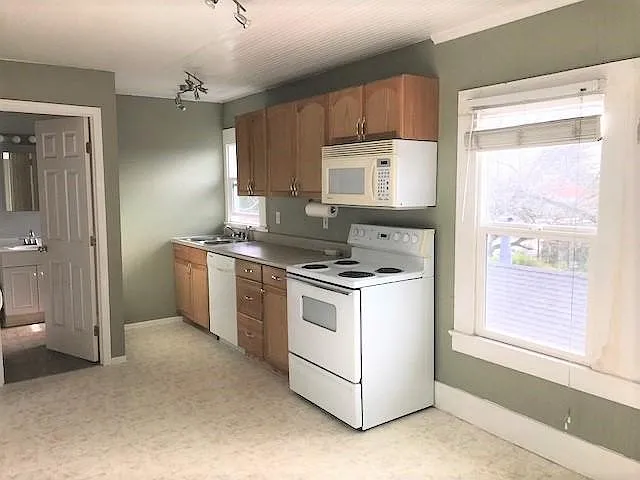 Kitchen with abundant storage and spacious dining area