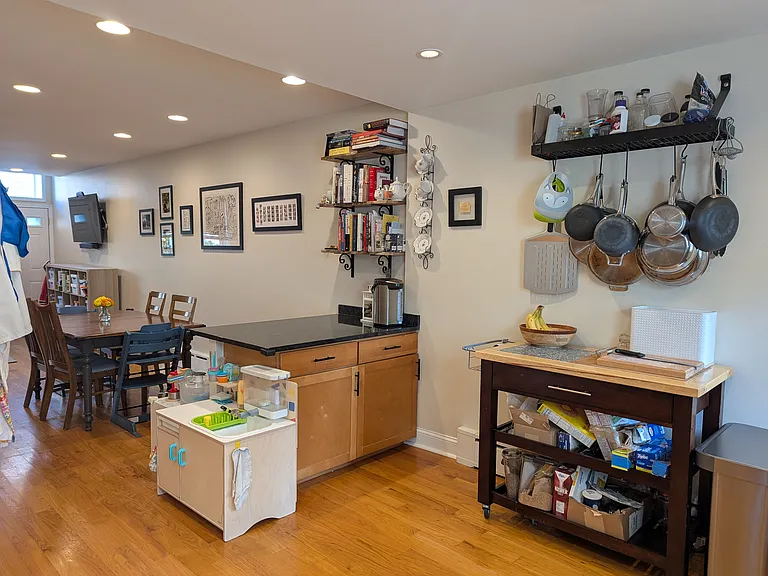 Kitchen Island and pot rack (included).