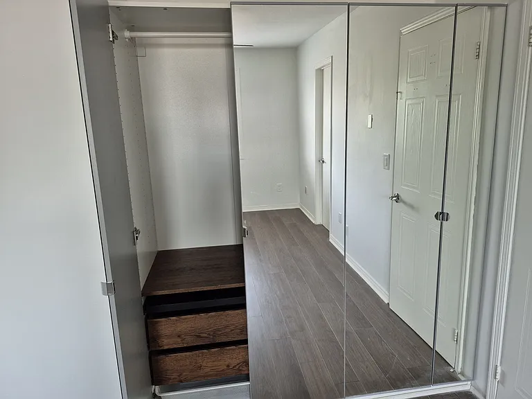Master Bedroom - Dual Double Door Closet with Drawer Storage
