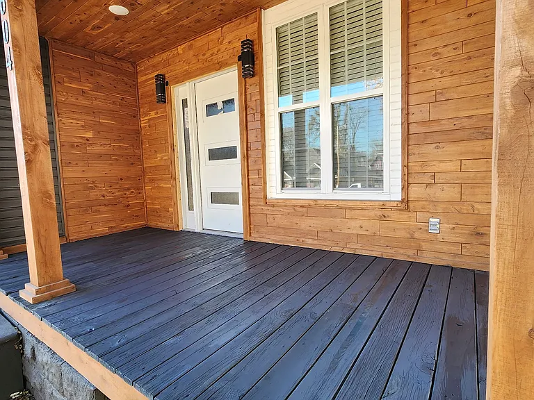 Front porch with new window and modern front door