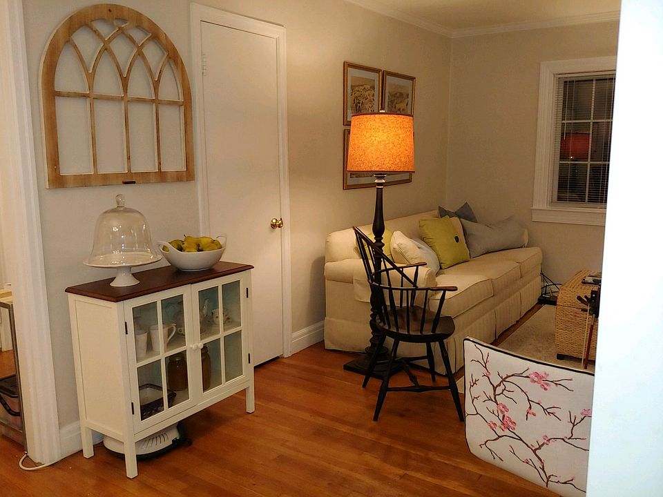 The door in the living room is a coat closet.