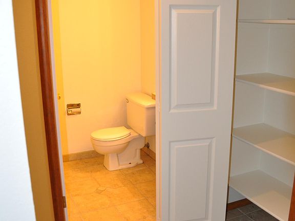 hall closet/pantry and half bath