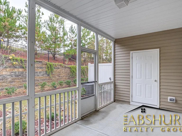 Private screened in patio with storage closet