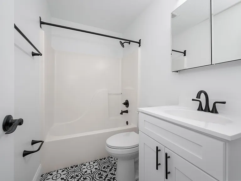Explore this chic bathroom designed with elegance and functionality in mind. Explore this chic bathroom designed with elegance and functionality in mind.