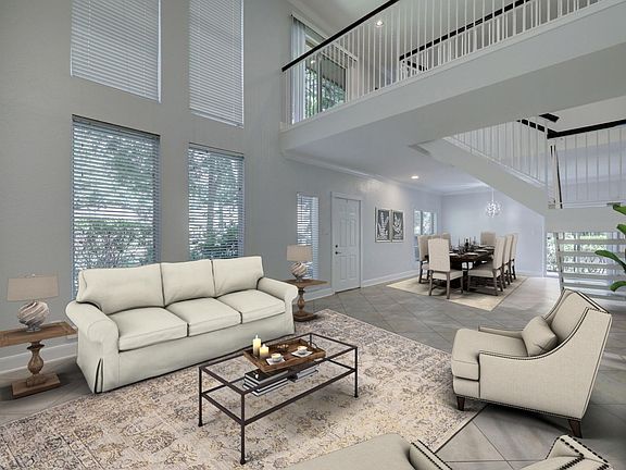**Virtually Staged Photo** Living and dining room areas