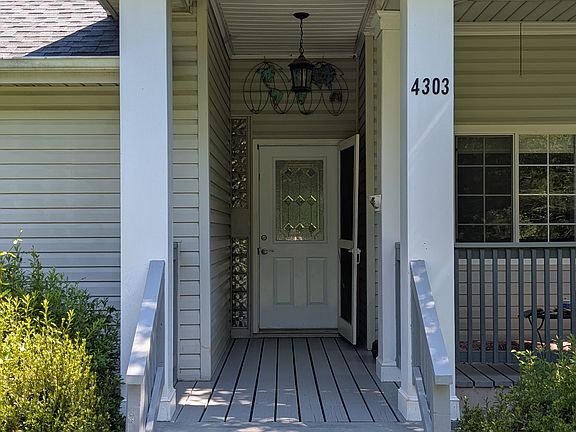 Front steps with covered porch.