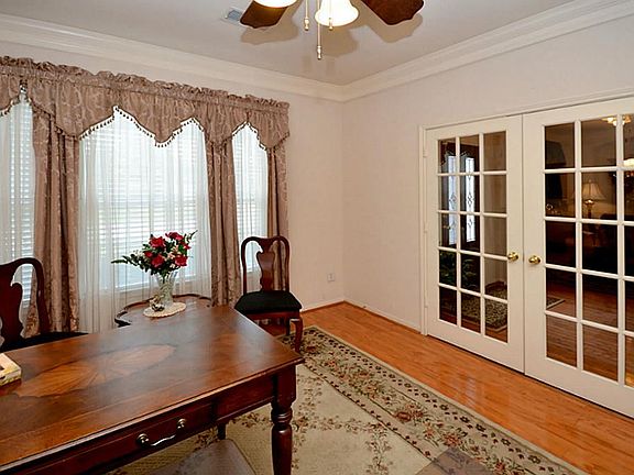 Don't miss the hardwood floors and wonderful natural light in your new study!