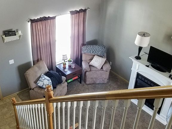 Living room viewed from the top of the stairs.