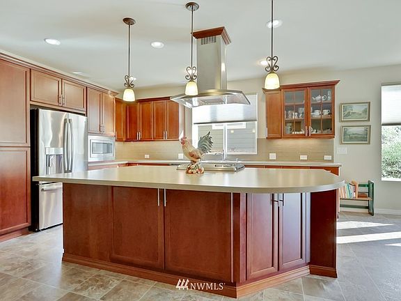 Open Kitchen with Large Island & Stainless Steel Appliances