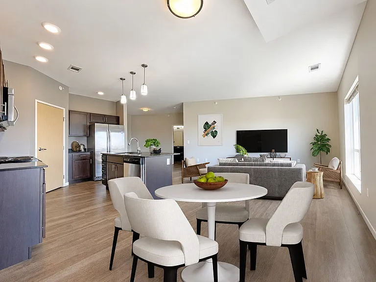 Elevate your lifestyle at Coulee Ridge Apartments, where modern elegance meets comfort. This spacious living area showcases stylish finishes and natural light, perfect for relaxing or entertaining. Schedule your tour today and envision your new home!