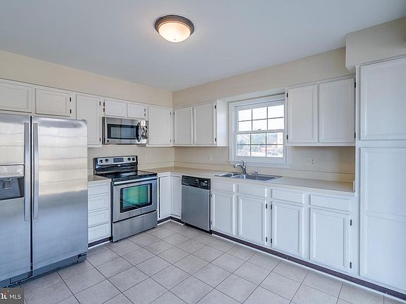 Ample Cabinetry and SS Appliances