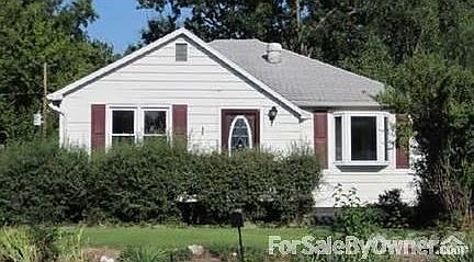 Front of house
						:
						Large side yard not shown in picture. Large bay window in front living room.