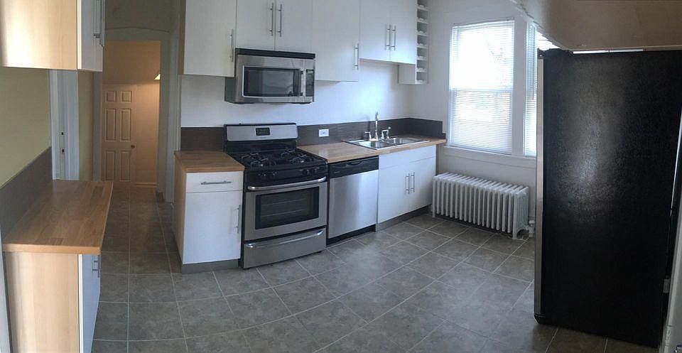 1st image of 5901 W Giddings St Side 1