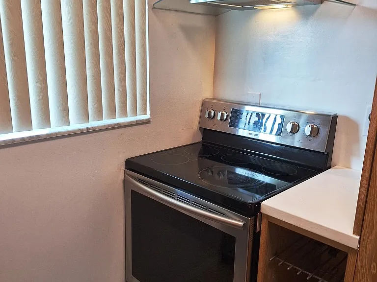 WINE RACK AND STOVE/OVEN AND HOOD