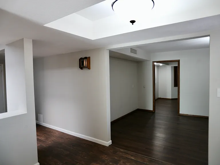 from entrance looking east into front additional living room and 5th bedroom or office or whatever use suits you. :)