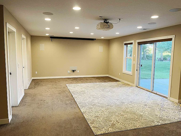 Large Basement Family Room with Projector, 7.2 Surround Sound System and Xbox installed