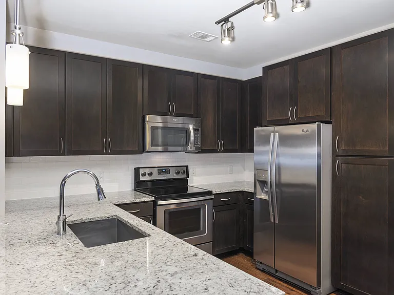 Modern Kitchens with Stainless Steel, Energy Star Appliances with Side-by-Side Refrigerator, Built-In Microwave, Tall Tub Dishwasher and Electric Range