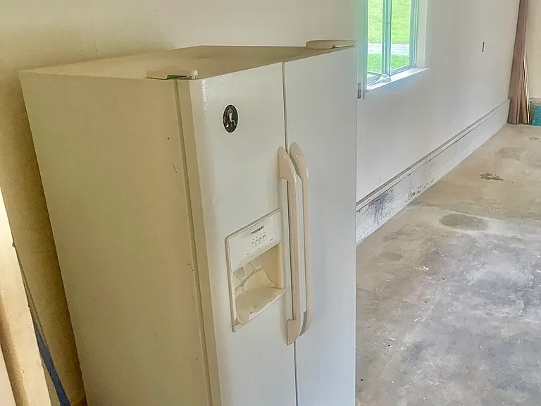 EXTRA REFRIGERATOR IN STORAGE THAT WILL BE PUT INTO A GARAGE IN SUMMER