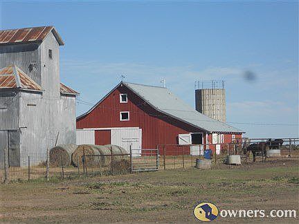 Grainary and 1 of 2 barns.