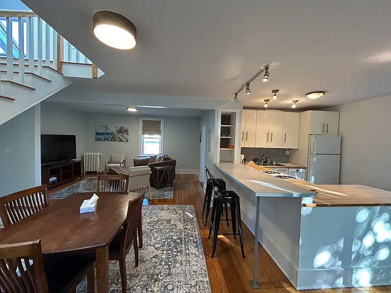 Dining room, living room, and kitchen