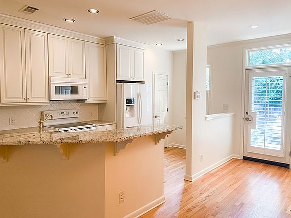 Front door and kitchen