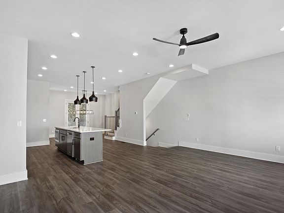 brand new upgraded appliances, quartz counters, gas range cooktop, oven also has convection and air fryer features. Range vent does filter outside.