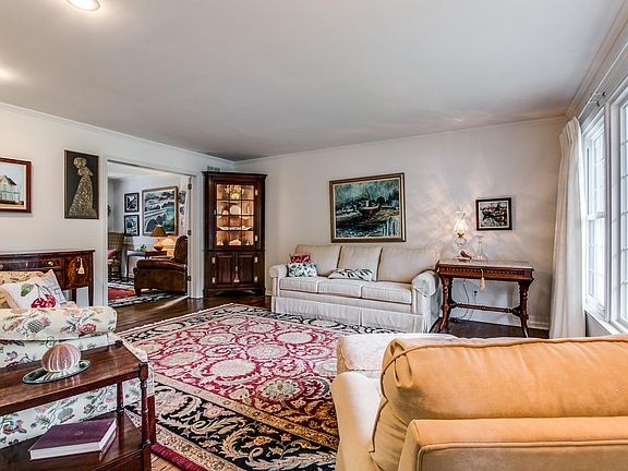 Grand living rm with french doors