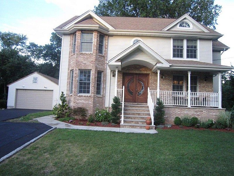 Front Lemonade Porch
						:
						Large property. Two car garage. beautiful Old Virginia style custom brick work