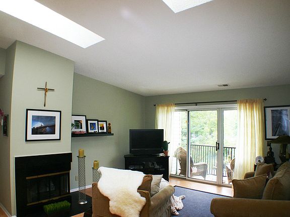 17 x 14 Living room with skylights & corner f/p