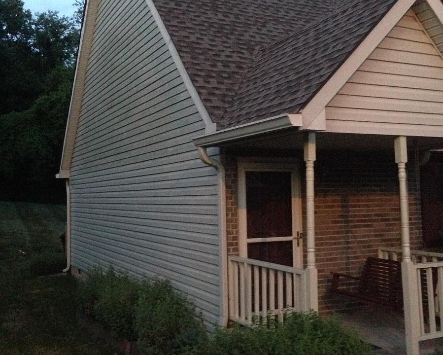 Side with raised garden beds