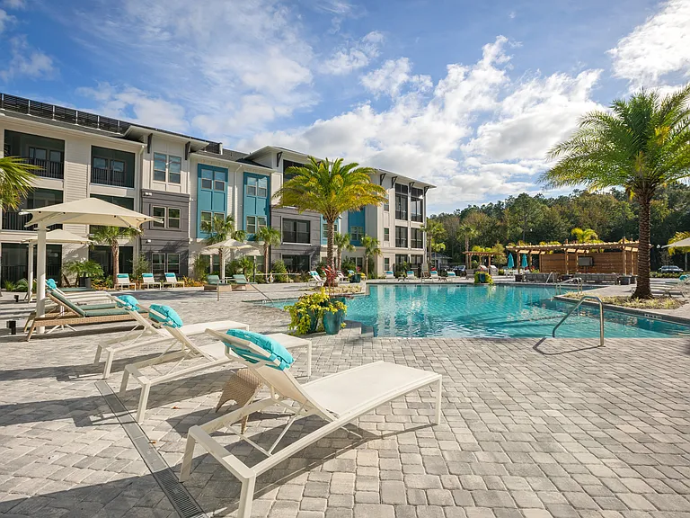 Soak up the sunshine by the sparkling pool.