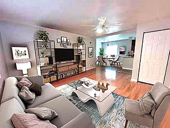 Large Living Room 
Beautiful hardwood floors - ceiling fan - large closet - Powder room attached