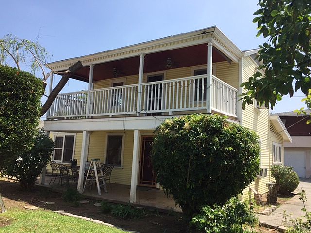 Fantastic outdoor space! Front usable covered porch on 1st floor & second floor balcony with sun shades for privacy.