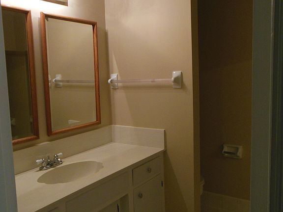 Full bath upstairs between 2 large bedrooms, shower over tub