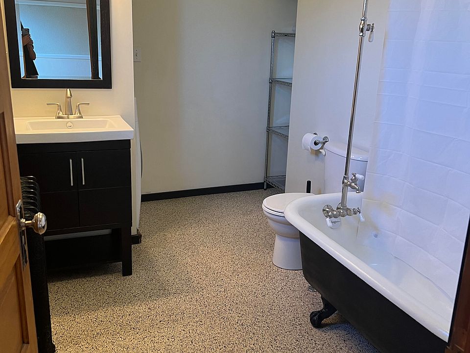 Large Bathroom, Clawfoot tub with shower, storage, washer/dryer unit (out of sight behind vanity)