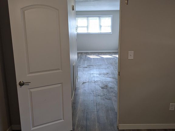 Bedroom looking out towards kitchen and living room.