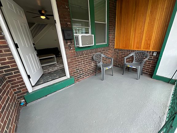 Welcome to 5 Dawson Ct. - Front porch walks out to green grass courtyard