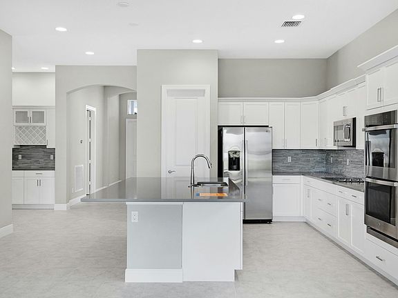 Kitchen to Dining 12446 SW Sunrise Lake Terrace