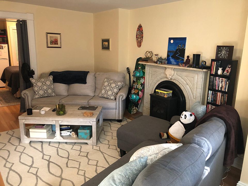 Living room w/ fireplace from windows