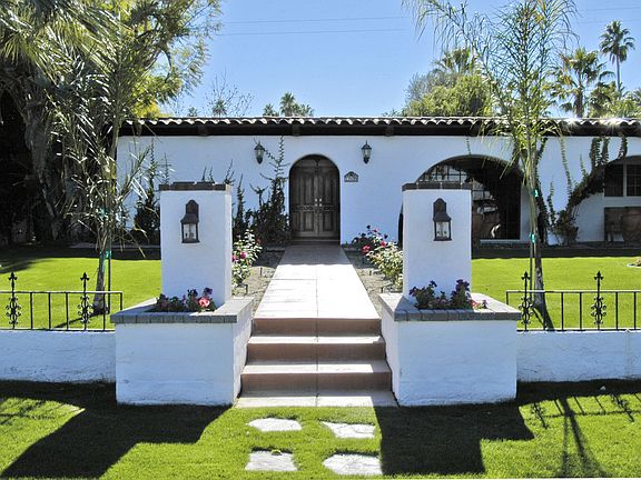 formal walk  to front doors - spanish fountain in veranda courtyard