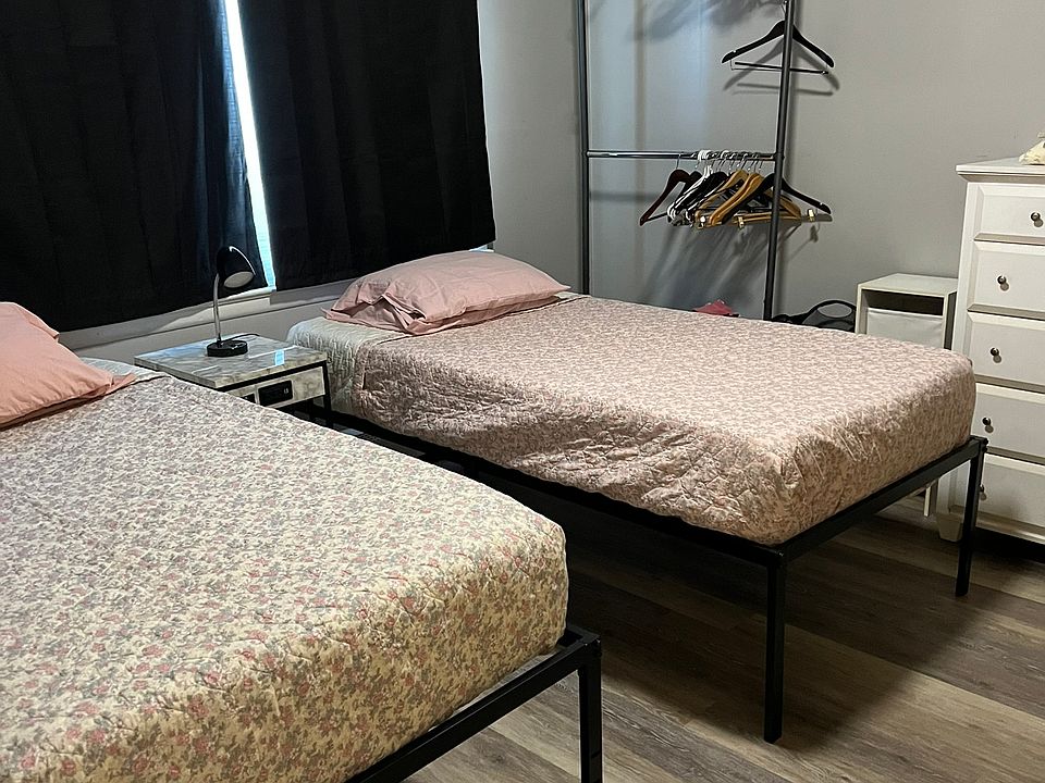 Bedroom. 2 double beds that can fit together to make king size bed.