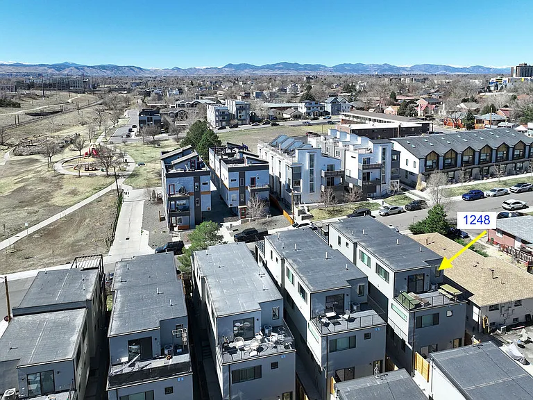 "End unit" with smaller building to the north allowing for backyard privacy