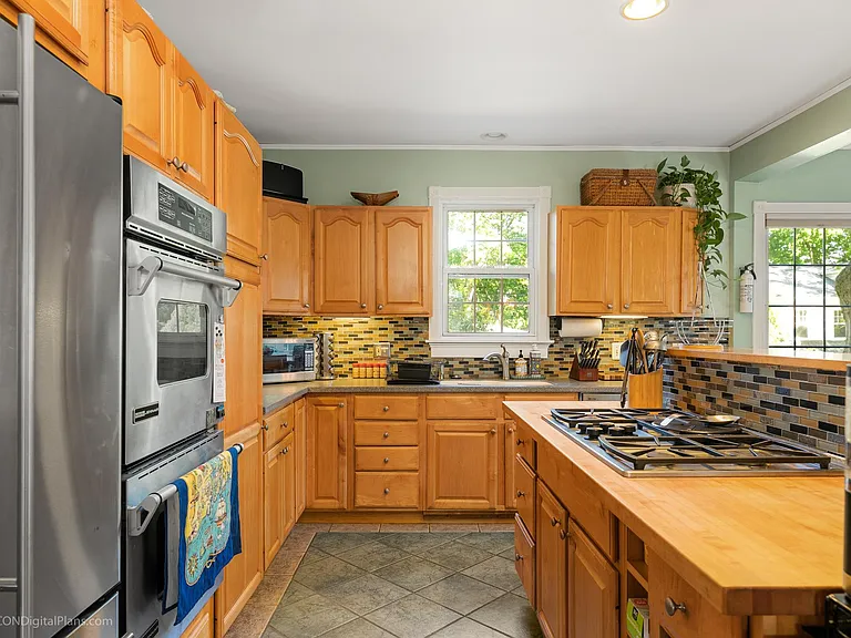 Fully equipped kitchen includes cookware, utensils, glassware, microwave, double oven, refrigerator, ice machine, gas range and much more.