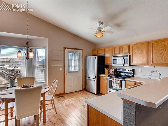 Bright and airy kitchen and dining area with a large bay window!