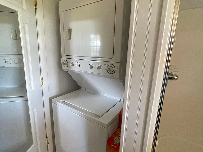 Stack washer & dryer upstairs. Additional washer & dryer hookups in basement.