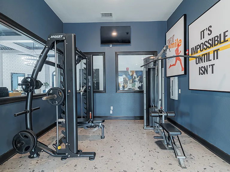 Our fitness center is equipped with a variety of machines: elliptical, treadmill, stairstepper, squat machine, cable and resistance machines, yoga balls, bike, and free weights